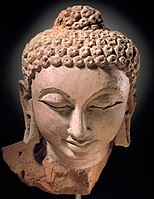 Terracotta Buddha head, Devnimori, Gujarat, 375-400. These early terracottas show the influence of the Greco-Buddhist art of Gandhara,[13] and belong to the art of the Western Satraps.[13]