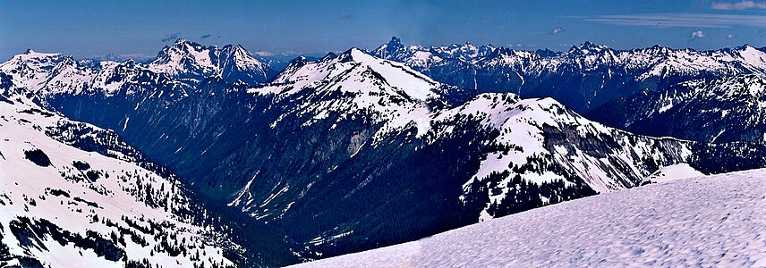 Ruth Mountain summit vista. Peaks include Tomyhoi Peak, Mount Larrabee, Mount Chardonnay, Slesse Mountain, Hannegan Peak, and Mount Rexford