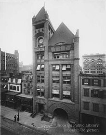 A black and white picture of the Brooklyn Fire Headquarters as seen circa 1910