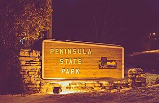 Peninsula State Park is mostly located in the town.