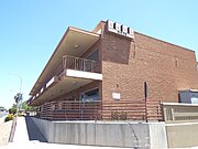 The Nuss Building was built in 1960 and is located at 4419 N. Scottsdale Road and Shoeman Lane in downtown Scottsdale. The historic building, though it houses various small businesses, is partially vacant.