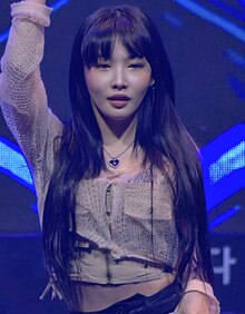 Chung Ha strikes an ending pose after performing her song "Snapping".