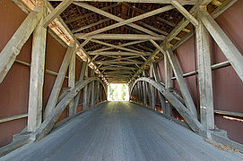 The inside of the bridge showing the Burr arch trusses