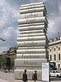 Image 5412-metre-high (40 ft) stack of books sculpture at the Berlin Walk of Ideas, commemorating the invention of modern book printing (from History of books)
