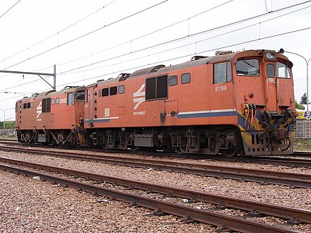 No. E1169 in Spoornet's lined orange livery at Centurion, Pretoria, Gauteng, 30 September 2009