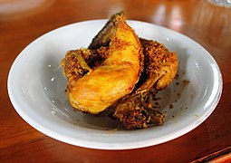 Ayam bumbu, a Minang fried chicken in Aie Badarun restaurant, Tanah Datar.