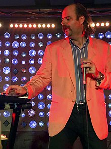 Donny Benét playing the keyboard for a live performance in Brooklyn, New York