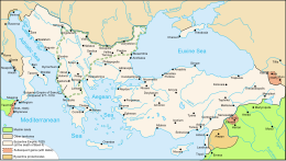 Map showing the extent of the Byzantine Empire in 1025 in cream, along with later annexations in deep red, protectorates in ochre, and Muslim territories in green