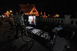 A local street vendor by the Wat Phumin at night