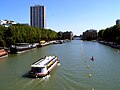 Bassin de la Villette from the central footbridge towards the old warehouses.