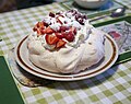 Image 49Pavlova, a popular New Zealand dessert, garnished with cream and strawberries. (from Culture of New Zealand)
