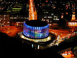An aerial photograph of the BFI IMAX theatre in London at night