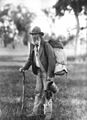 Image 45A swagman in bushman's apparel, wearing a brimmed hat and carrying swag, and billy can. (from Culture of Australia)