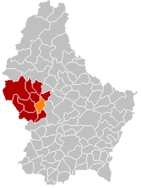 于塞尔当日在卢森堡地图上的位置，于塞尔当日为橙色，雷当日县为深红色