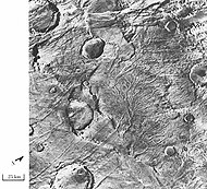 Branched channels in Thaumasia quadrangle, as seen by Viking Orbiter. Networks of channels like this are strong evidence for rain on Mars in the past.