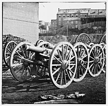 Black and white photo shows M1841 6-pounder field guns.