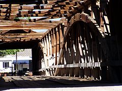 Detail of Burr Arches and double span are visible because of the sunlight coming through the missing roof after 2006 storm