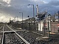 Westbound view of platforms, with works for the station rebuilding and level crossing removal in the background, November 2022