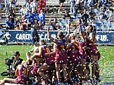 Brisbane Lions players after being presented with the 2023 AFL Women's premiership cup