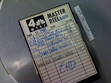 A videotape inside a cover with a cover sheet containing the WTVJ logo and various annotations