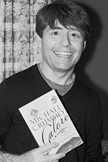 Author Michael Crummey poses with a copy of his book, Galore, at a fundraiser for the Writers' Trust of Canada