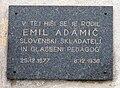 Plaque: "The Slovenian composer and music teacher Emil Adamič was born in this house (25 Dec. 1877 – 6 Dec. 1936)"