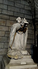 Cardinal Guibert, leading proponent of the basilica, holding its model
