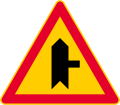 Junction with a minor road (formerly used )