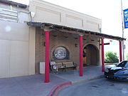 La Paloma Bar was built in 1912 and is located in 255 Main St. Originally a saloon, the building served as a pool hall during statewide Prohibition. Listed as Historic by the Historic District Advisory Commission.