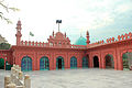 The shrine complex includes a small mosque