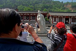 Tourist taking photo of Yang Guifei statue