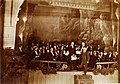 Photo of orchestra and conductor