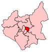 A small constituency, located in the centre of the county, to the east of two other small constituencies.
