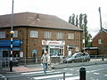 Shops on Butcher Hill/Spen Lane. Midgleys was used in Yorkshire Television drama Fat Friends