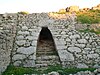 Postern gate of the Royal Palace of Ugarit with walls leaning 25 degrees