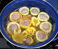 Pork stuffed cucumber and zucchini soup in pork broth.