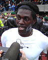 Emmanuel Adebayor giving interviews after the match