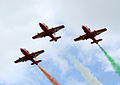 Indian Airforce's Suryakiran Aerobatic Team making clouds of Indian tricolor in areal show 2007.