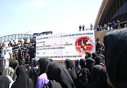 Shias congregating outside the Sydney Opera House in Australia.