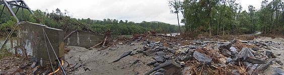 Damage caused by flood waters on the White River to the Royalton, Vermont bridge.