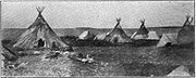 Tipis of the Tłı̨chǫ (Dogrib) First Nations on the shores of Slave Lake at Fort Resolution, circa 1907