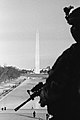 Image 23Photograph of a National Guardsman looking over the Washington Monument in Washington D.C., on January 21, 2021, the day after the inauguration of Joe Biden as the 46th president of the United States (from Photojournalism)