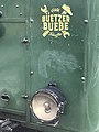 Front of WAB He 2/2 54 with inscription Gölä Büetzer Buebe Trauffer and one of the electric lamps with socket, 2020