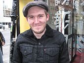 A shot of Brian Fallon, looking into a nearby camera.