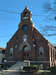 Photo of the front facade of Saint Joseph Catholic Church in Alexandria, Virginia