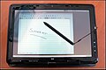 HP TouchSmart tx2 laptop，二合一笔记本，图中为其平板模式