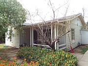The Douglas-Gitlis House was built in 1935 and is located at 1206 Ash Ave. The property is listed in the Tempe Historic Property Register.