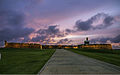 Entrance view of castle at dusk from esplanade