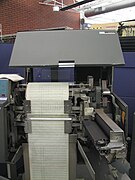 Wide ink ribbon can be seen at right of this opened IBM 1403 line printer