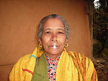 A woman in eastern Nepal wearing Jhamke Bulaki (a septum ring with ornamental designs)